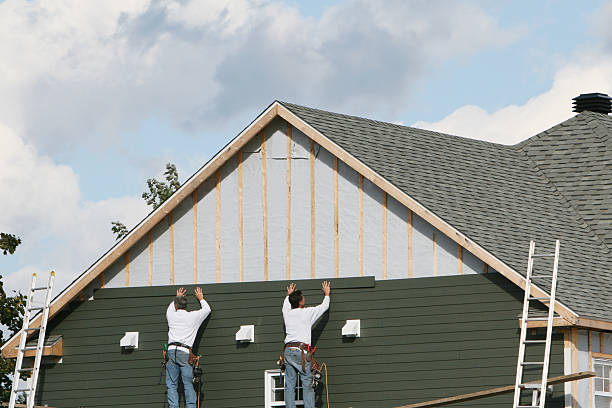 Professional Emergency Siding Repair technician working in Olivia, NC